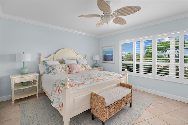 bedroom featuring light tile patterned floors, ornamental molding, baseboards, and ceiling fan