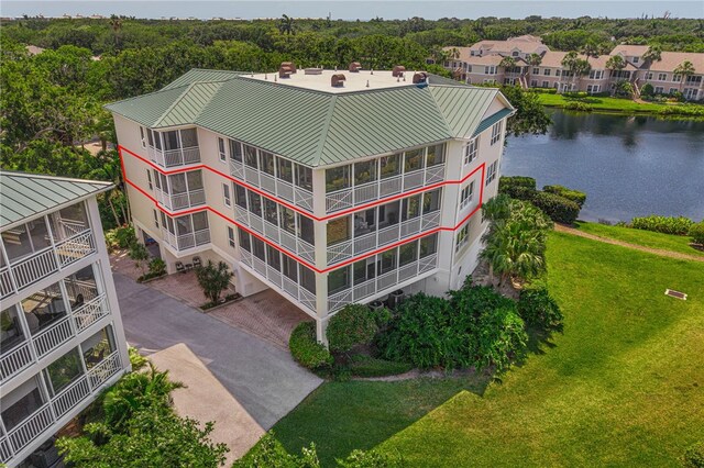 view of property with a water view