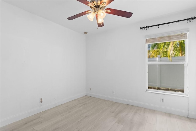 empty room featuring light hardwood / wood-style floors and ceiling fan