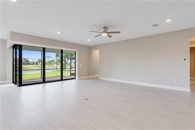 unfurnished room featuring baseboards, visible vents, ceiling fan, and recessed lighting