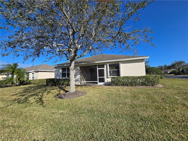 exterior space with a lawn