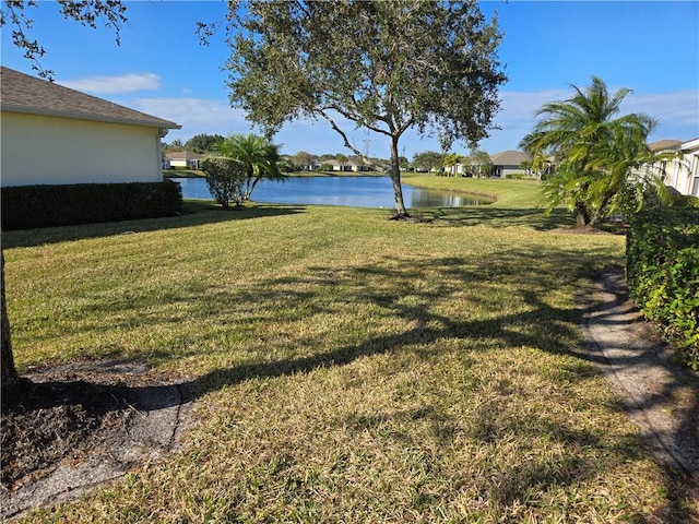 view of yard with a water view