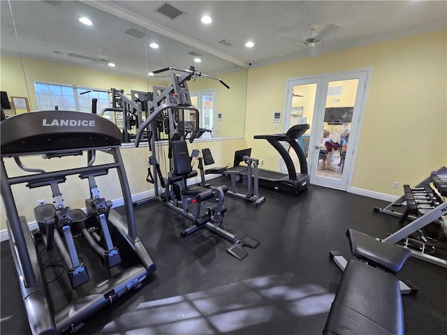 gym featuring ceiling fan and ornamental molding