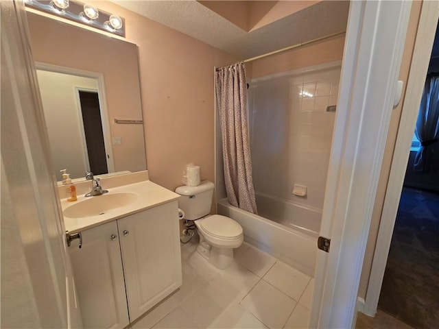 full bathroom featuring tile patterned flooring, shower / bath combo, toilet, and vanity