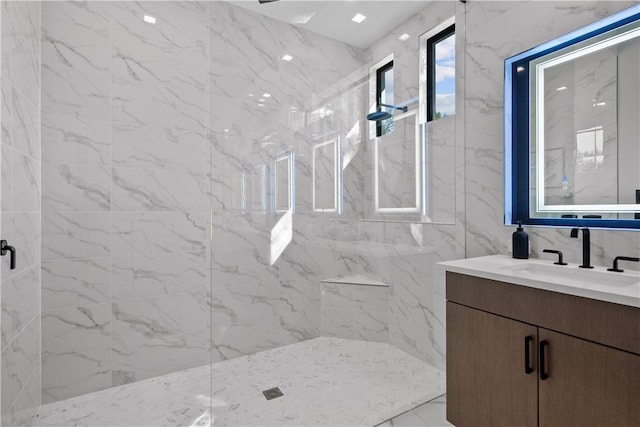 9259 Seaglass Ct, Vero Beach, FL 32963 - bathroom with vanity and a marble finish shower