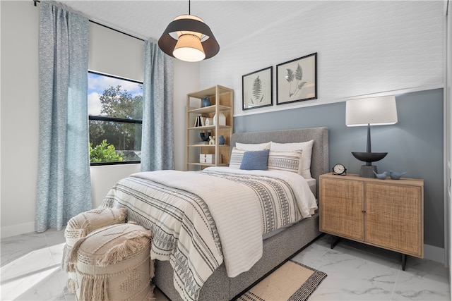 9259 Seaglass Ct, Vero Beach, FL 32963 - bedroom featuring marble finish floors and baseboards