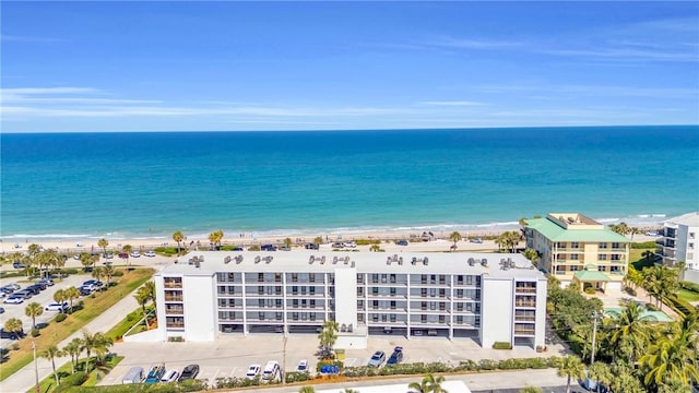 bird's eye view with a view of the beach and a water view