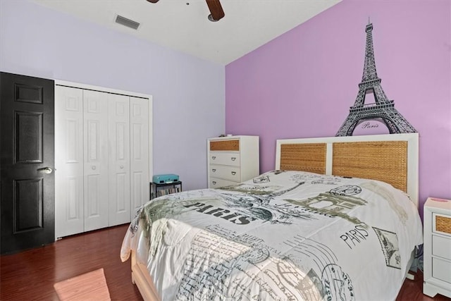 bedroom featuring ceiling fan, a closet, and dark hardwood / wood-style floors