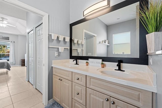 bathroom with vanity, tile patterned floors, and ceiling fan