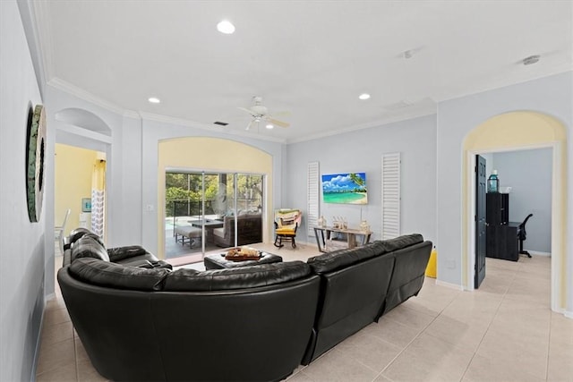 living room with crown molding, ceiling fan, and light tile patterned floors