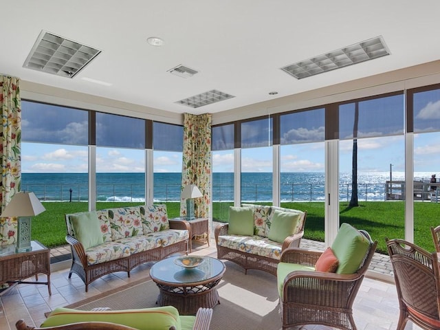 3554 Ocean Dr Unit 202S, Vero Beach, FL 32963 - sunroom featuring a water view and plenty of natural light