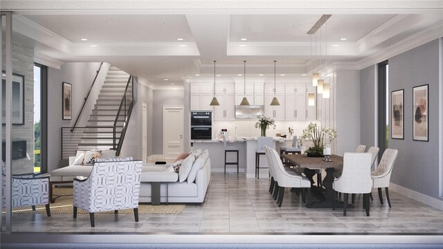 dining area featuring light tile patterned floors, crown molding, and a tray ceiling