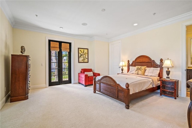 1510 Ocean Dr Unit 2, Vero Beach, FL 32963 - bedroom with light carpet, crown molding, french doors, access to exterior, and baseboards
