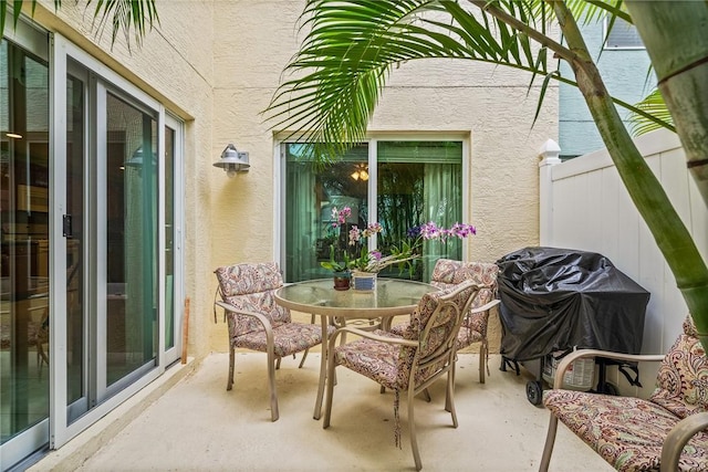 view of patio with a grill