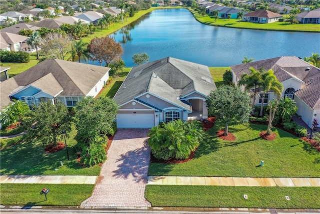 bird's eye view with a water view