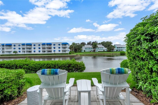 exterior space with a water view