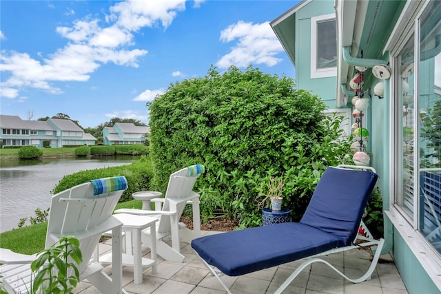 view of patio / terrace with a water view