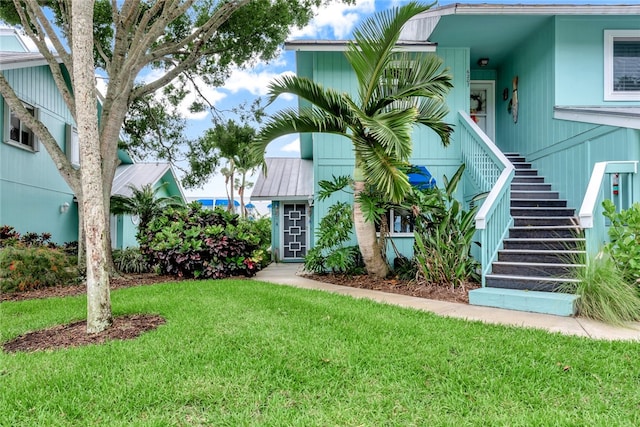 view of front of home with a front yard