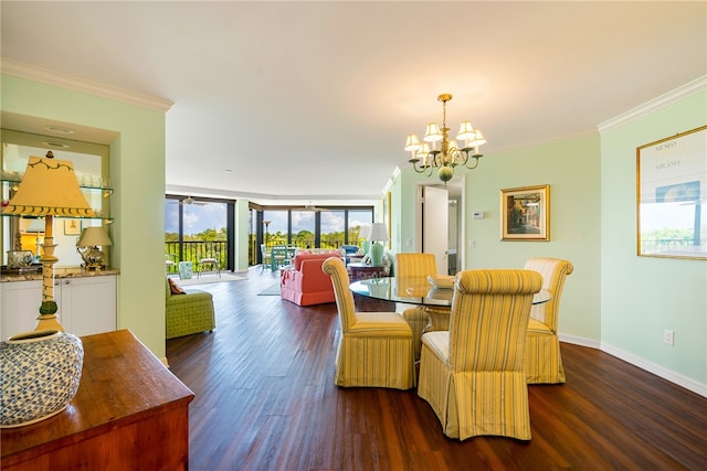 dining room featuring expansive windows, dark hardwood / wood-style floors, crown molding, and a notable chandelier