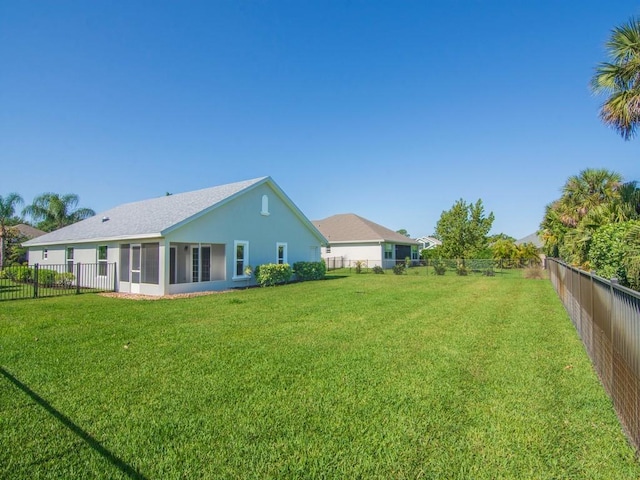 8340 Paladin Sq, Vero Beach, FL 32967 - fenced backyard featuring a sunroom