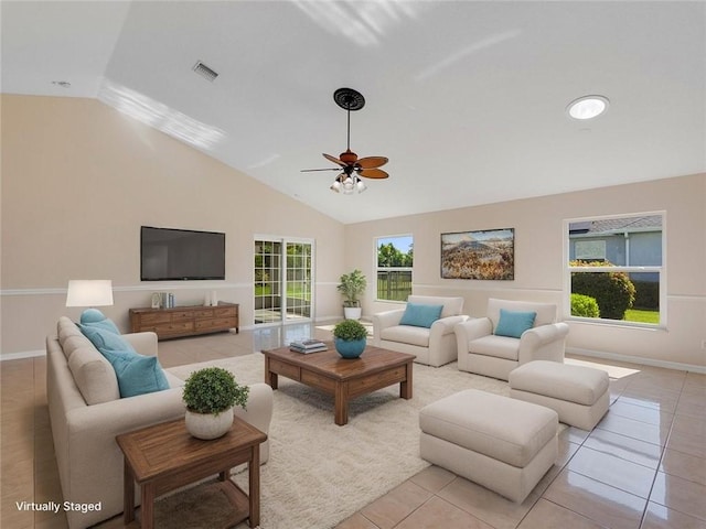 8340 Paladin Sq, Vero Beach, FL 32967 - living room with light tile patterned floors, ceiling fan, and high vaulted ceiling