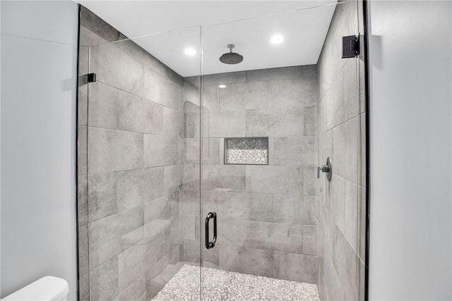 7205 Kamelya St SW, Vero Beach, FL 32968 - bathroom featuring toilet, a stall shower, and recessed lighting