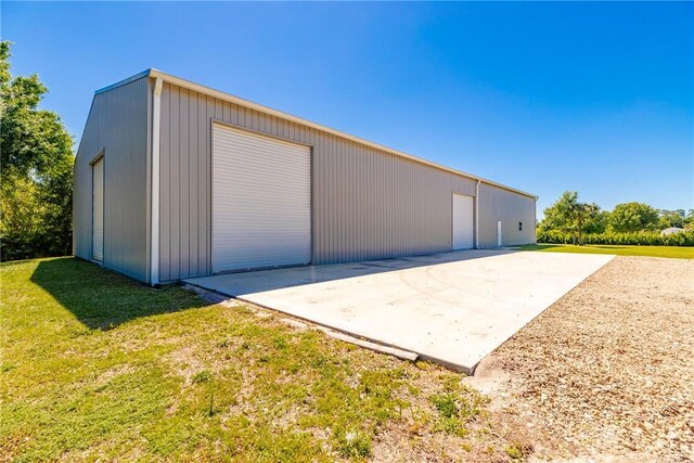 7205 Kamelya St SW, Vero Beach, FL 32968 - view of outdoor structure with an outbuilding