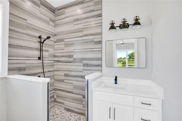 7205 Kamelya St SW, Vero Beach, FL 32968 - full bath with vanity, ceiling fan, and walk in shower