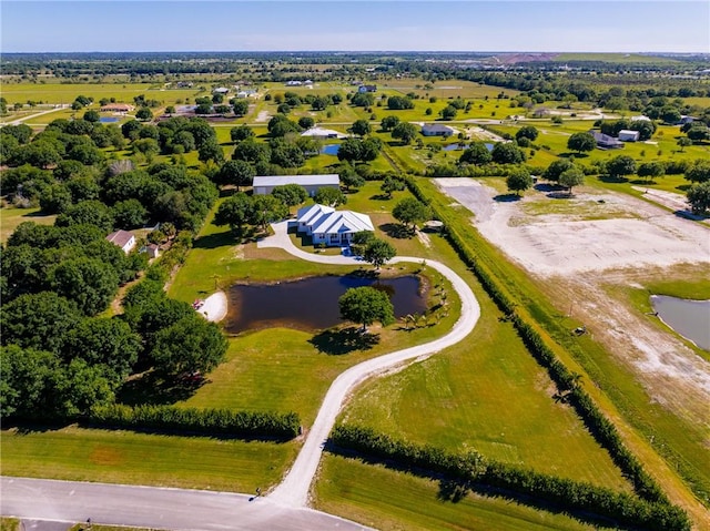 7205 Kamelya St SW, Vero Beach, FL 32968 - bird's eye view with a water view and a rural view