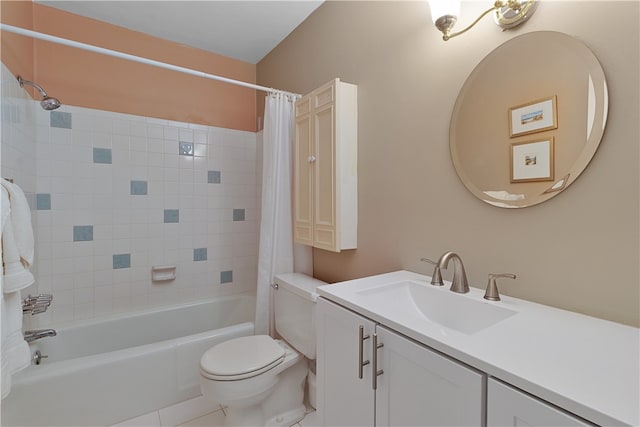 full bathroom featuring toilet, vanity, tile patterned flooring, and shower / bathtub combination with curtain