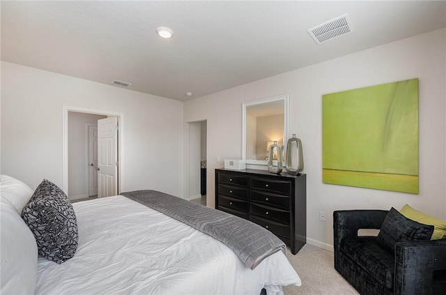 bedroom featuring carpet, visible vents, and baseboards