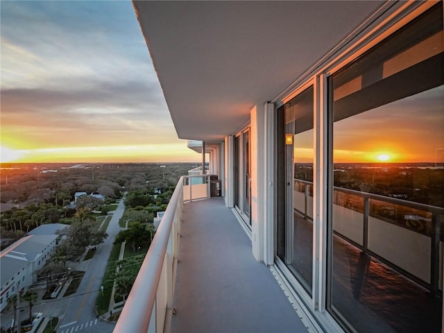 view of balcony at dusk