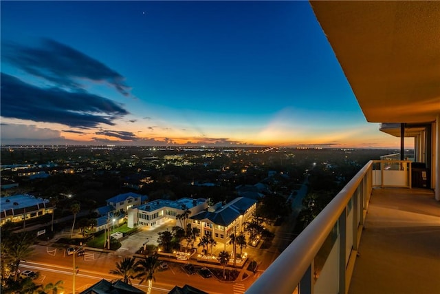 view of balcony at dusk