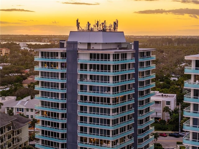 view of outdoor building at dusk