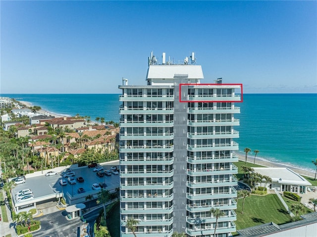 view of building exterior with a water view