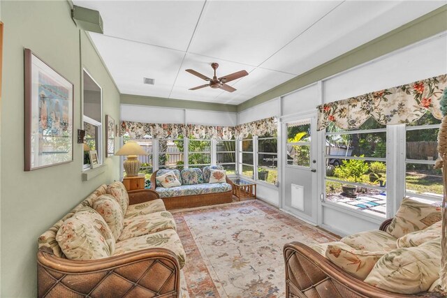 843 22nd Pl, Vero Beach, FL 32960 - sunroom / solarium featuring a ceiling fan and an outdoor hangout area