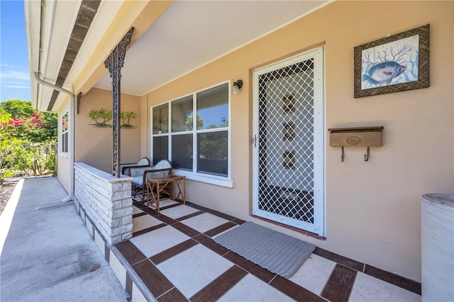 843 22nd Pl, Vero Beach, FL 32960 - property entrance featuring stucco siding