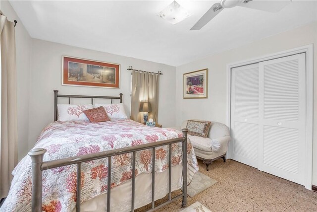 843 22nd Pl, Vero Beach, FL 32960 - bedroom featuring speckled floor, a closet, and ceiling fan