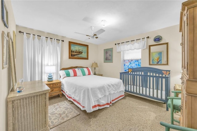 843 22nd Pl, Vero Beach, FL 32960 - bedroom with ceiling fan and speckle patterned floor