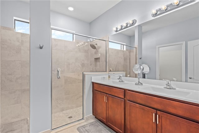 bathroom featuring vanity and walk in shower