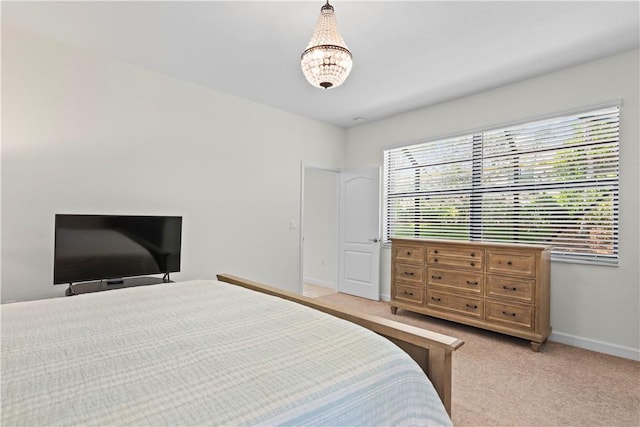 bedroom with light colored carpet