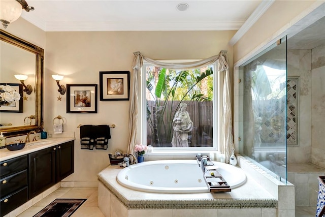 bathroom with tile patterned flooring, crown molding, a relaxing tiled tub, and vanity