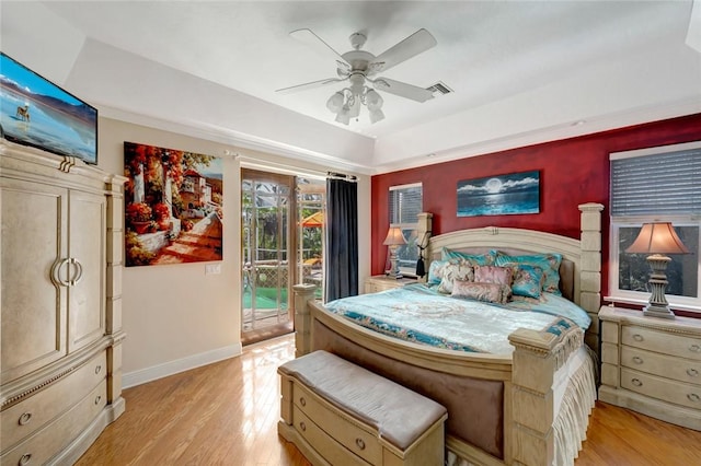 bedroom featuring access to outside, ceiling fan, and light wood-type flooring