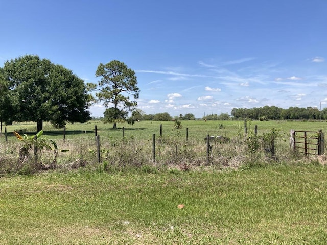 10186 NE 30th St, Okeechobee, FL 34974 - view of yard featuring a view of countryside