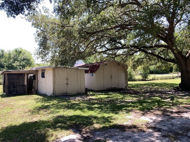 10186 NE 30th St, Okeechobee, FL 34974 - view of green lawn