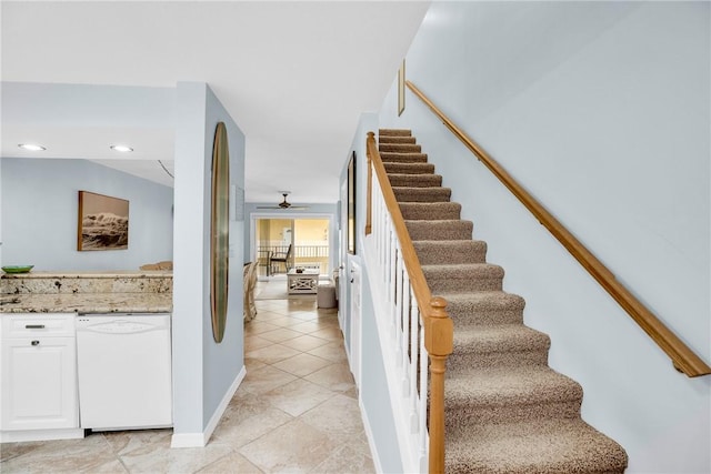 stairs featuring tile patterned floors, recessed lighting, a ceiling fan, and baseboards