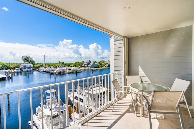 balcony featuring a water view