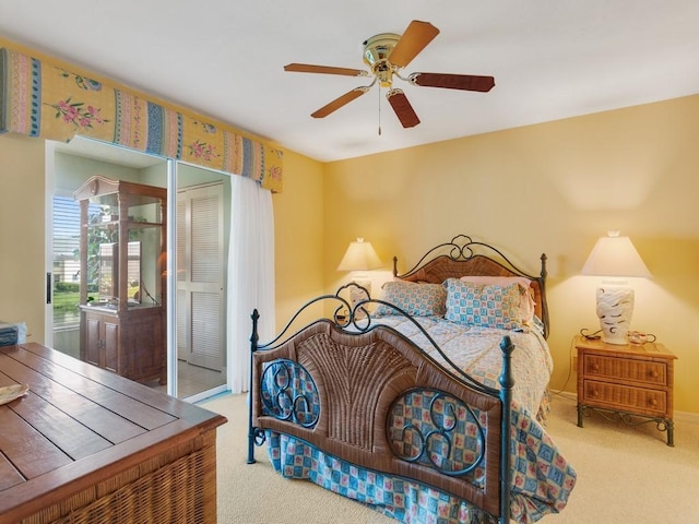 655 W Lake Jasmine Cir Unit 203, Vero Beach, FL 32962 - bedroom featuring carpet floors, a closet, and ceiling fan