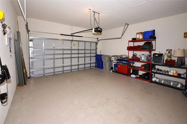 garage featuring a garage door opener