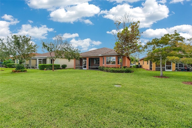 view of front of home featuring a front yard